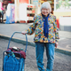 Shi Ping Tay, 81, wearing four different prints (one is tucked beneath her jacket).